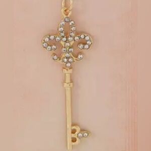 Gold Fleur-de-Lis Key Pendant. Add to a necklace, bracelet or key chain
